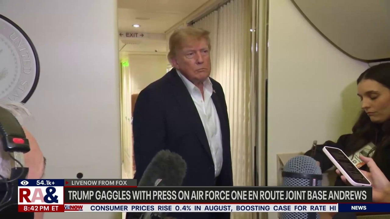 Trump gaggles with press on Air Force One