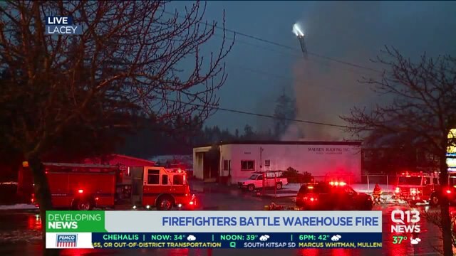 Crews battle warehouse fire in Olympia