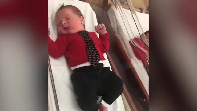 These newborns wore tiny cardigans to celebrate Mr. Rogers
