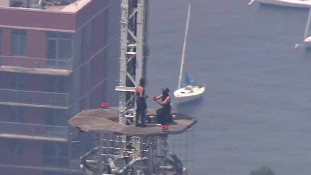 Two Protesters Climb Empire State Building Spire