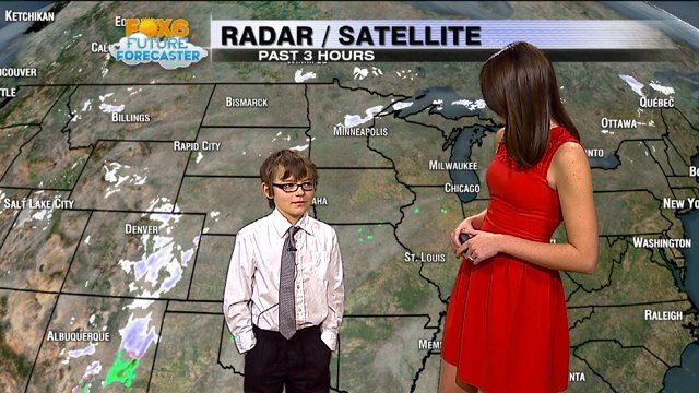 Nathan helps Stephanie Barichello with the weather