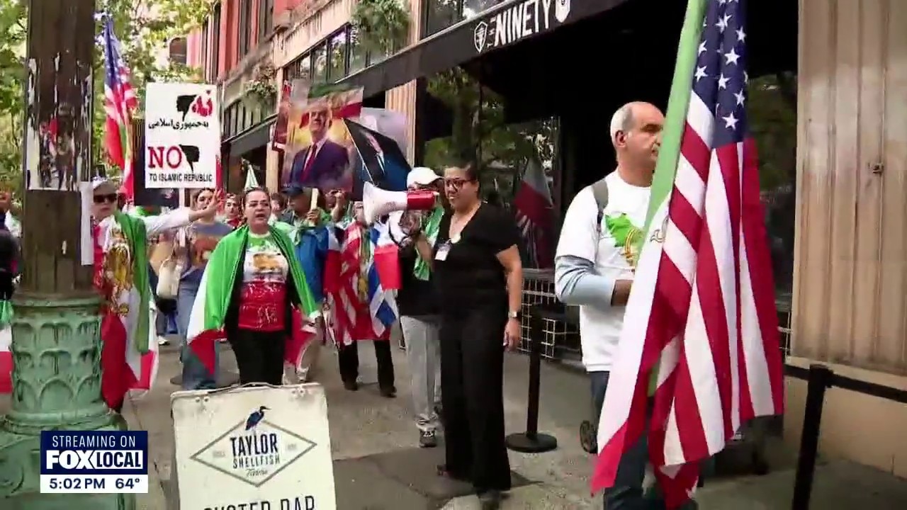 Iranian protesters march to Seattle Stadium ahead of World Cup match