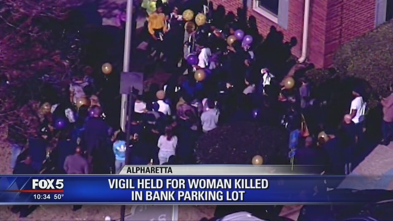 Vigil held for woman killed in bank parking lot | FOX 5 Atlanta
