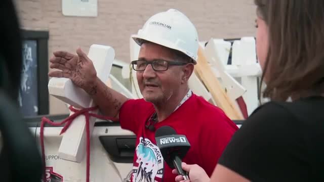 Man travels the country bringing crosses after shootings
