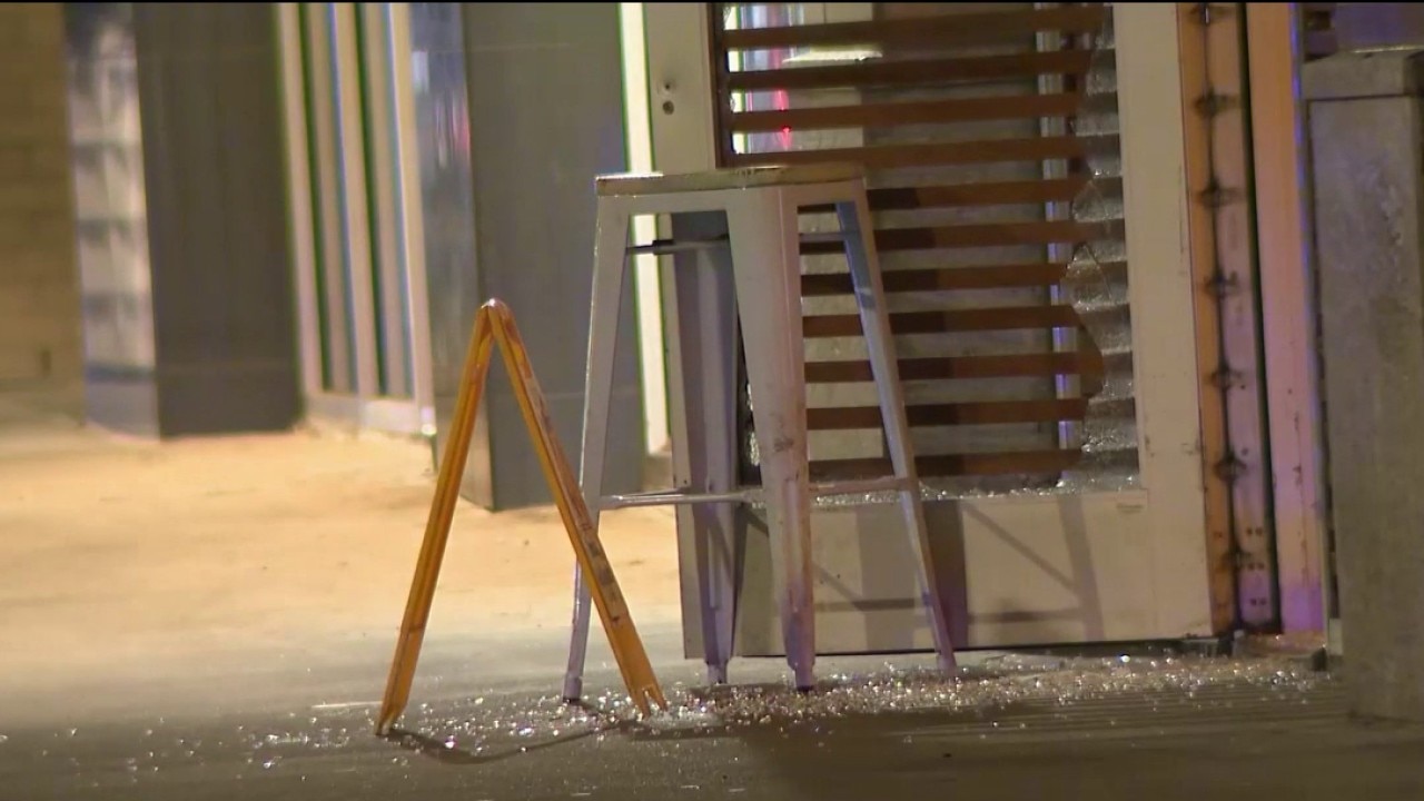 Midtown gunfire shatters restaurant front door