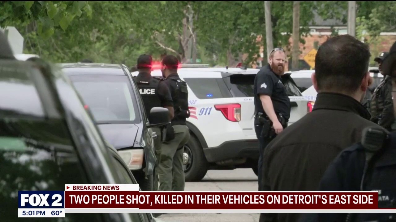 Two people shot to death inside vehicles, infant found uninjured