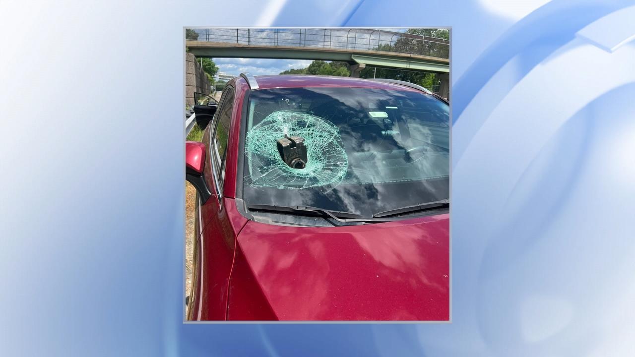 Large object smashes into Virginia woman's front windshield 