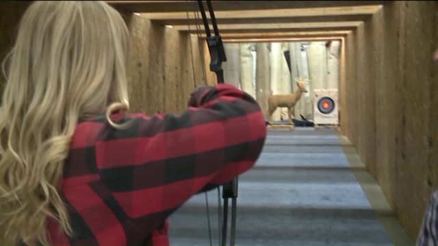 Laura talks archery with Rob Schafferhauser