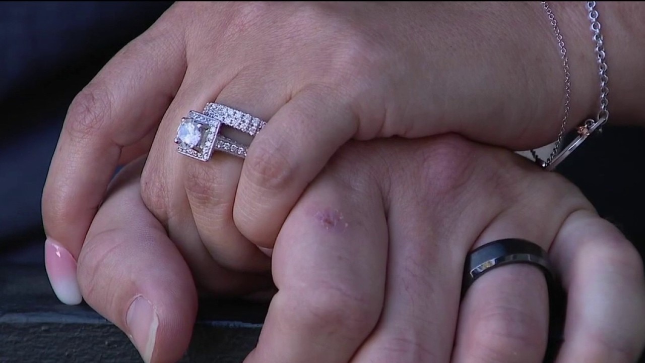 Couple's wedding photos stolen from rental car