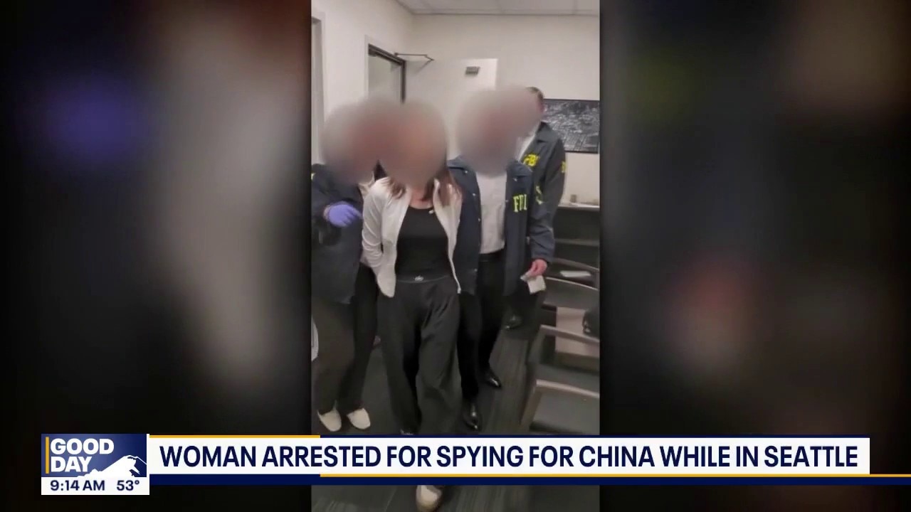 Woman arrested for spying for China while in Seattle
