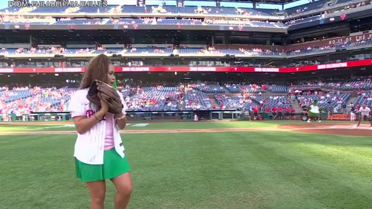 Alex Holley throws out first pitch at Phillies game