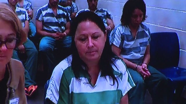 Woman arrested for Arlington fire estranged husband lived in building