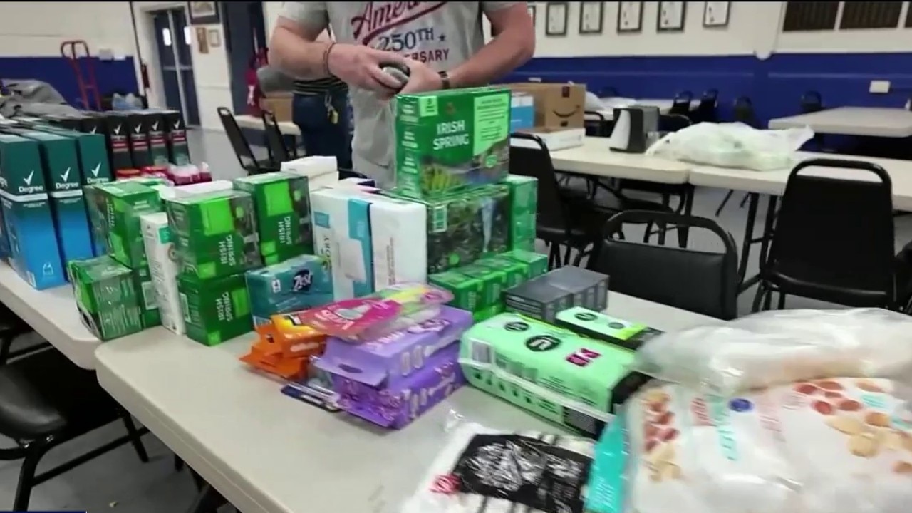 Newnan volunteers pack 100 boxes for troops