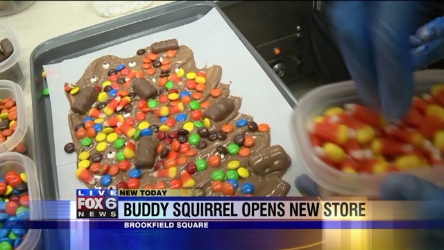 Laura helps prepare some of the new food items at Buddy Squirrel
