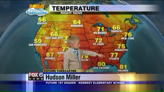 Hudson Miller helps FOX6 Meteorologist Rob Haswell with the weather