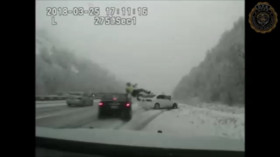 Dashcam video shows Utah trooper hit by car