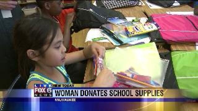 Woman donates school supplies