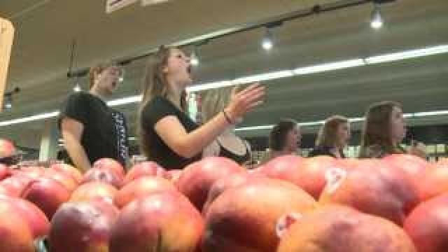 Flash mob catches grocery shoppers off guard
