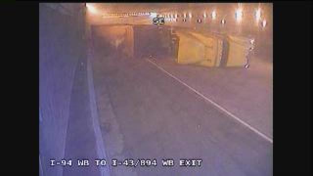 Raw DOT video: Semi overturns in tunnel