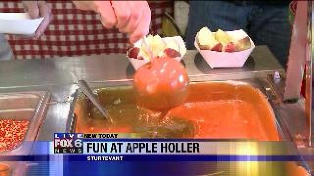 Creating caramel apples at Apple Holler