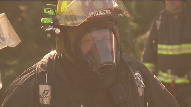 Professionals working outside in extreme heat take ample precaution