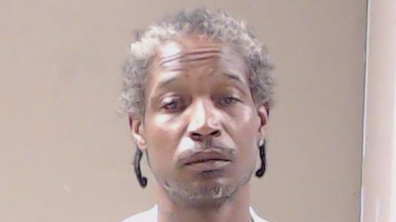 Dad charged with murder after leaving sons with loaded gun