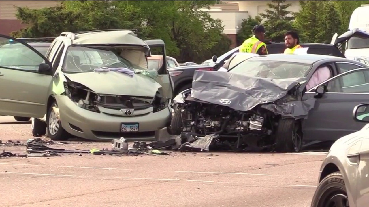 Highland Park car crash closes down roadway