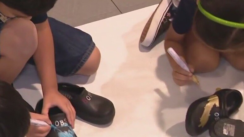 Shoe donation at Pine Shadows elementary