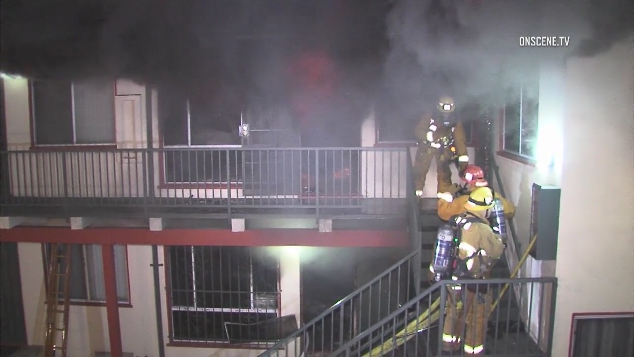 Woman dead after being rescued in apartment fire