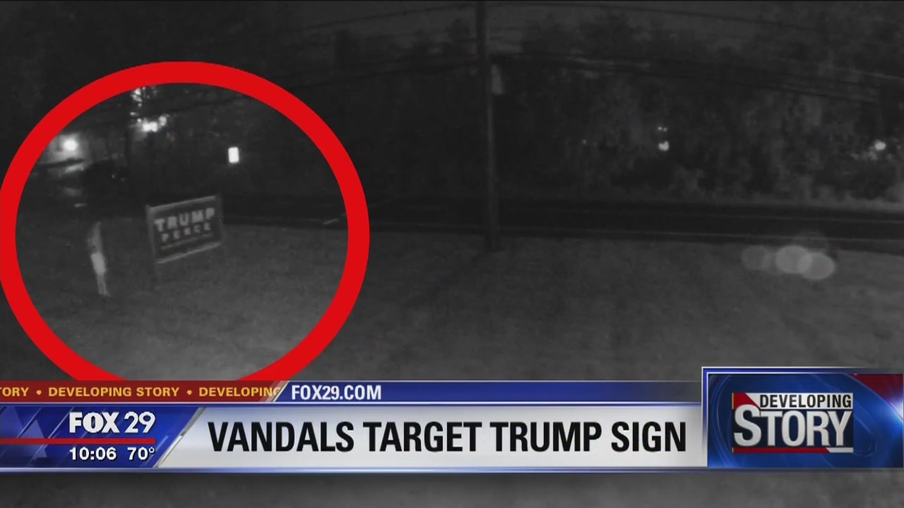 Vandals caught on tape attempting to tear down Trump sign