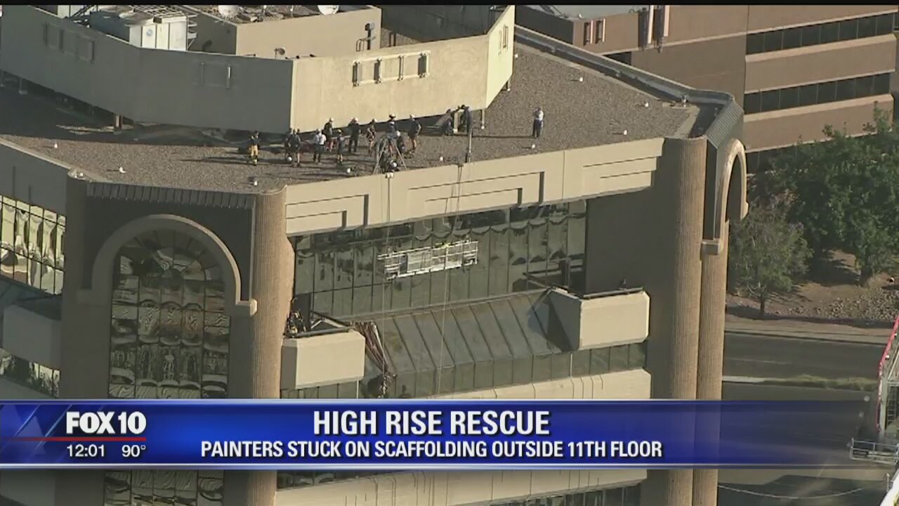 Firefighters rescue painters stuck outside Phoenix high-rise building