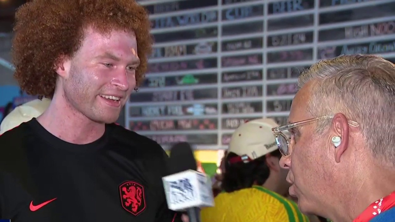 Fans head indoors after rain pauses FIFA Fan Fest in Houston