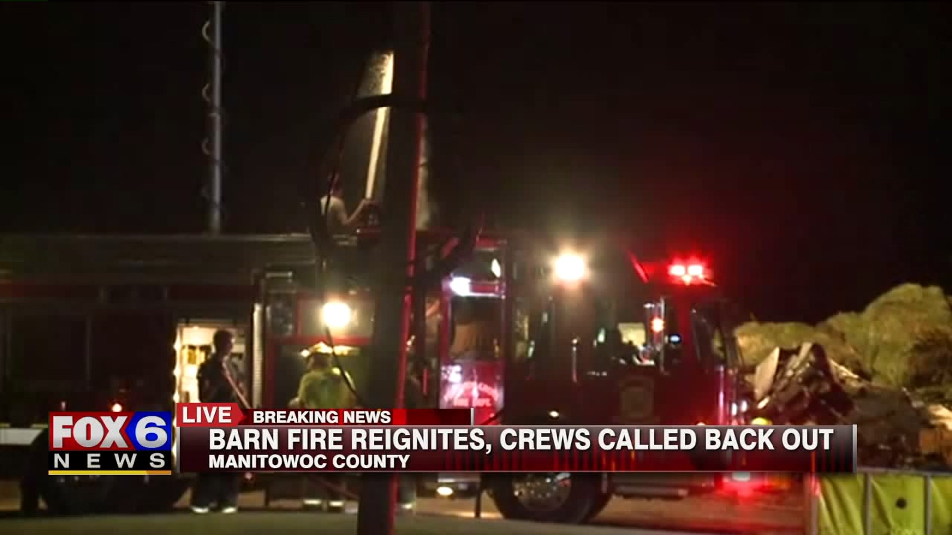 Crews called back out to barn fire, which reignited Monday night
