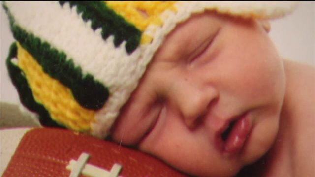 Keeping babies warm with a little green & gold action! Woman crochets Packers hats for newborns
