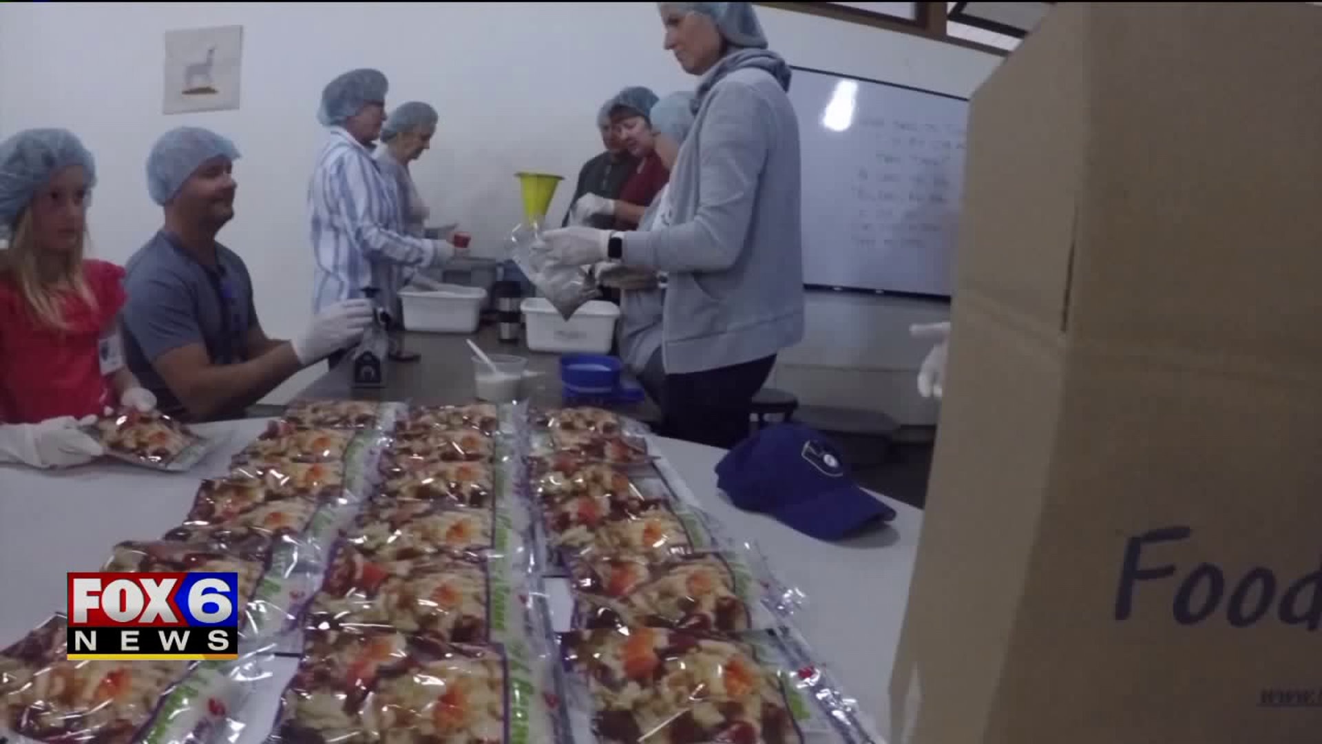 Our Lord`s United Methodist Church volunteers pack 180K meals for children in need