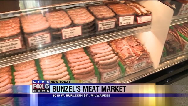 Kramp checks out the array of meats at Bunzel`s Meat Market