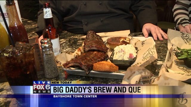 Laura checks out food at Big Daddy`s Brew and Que