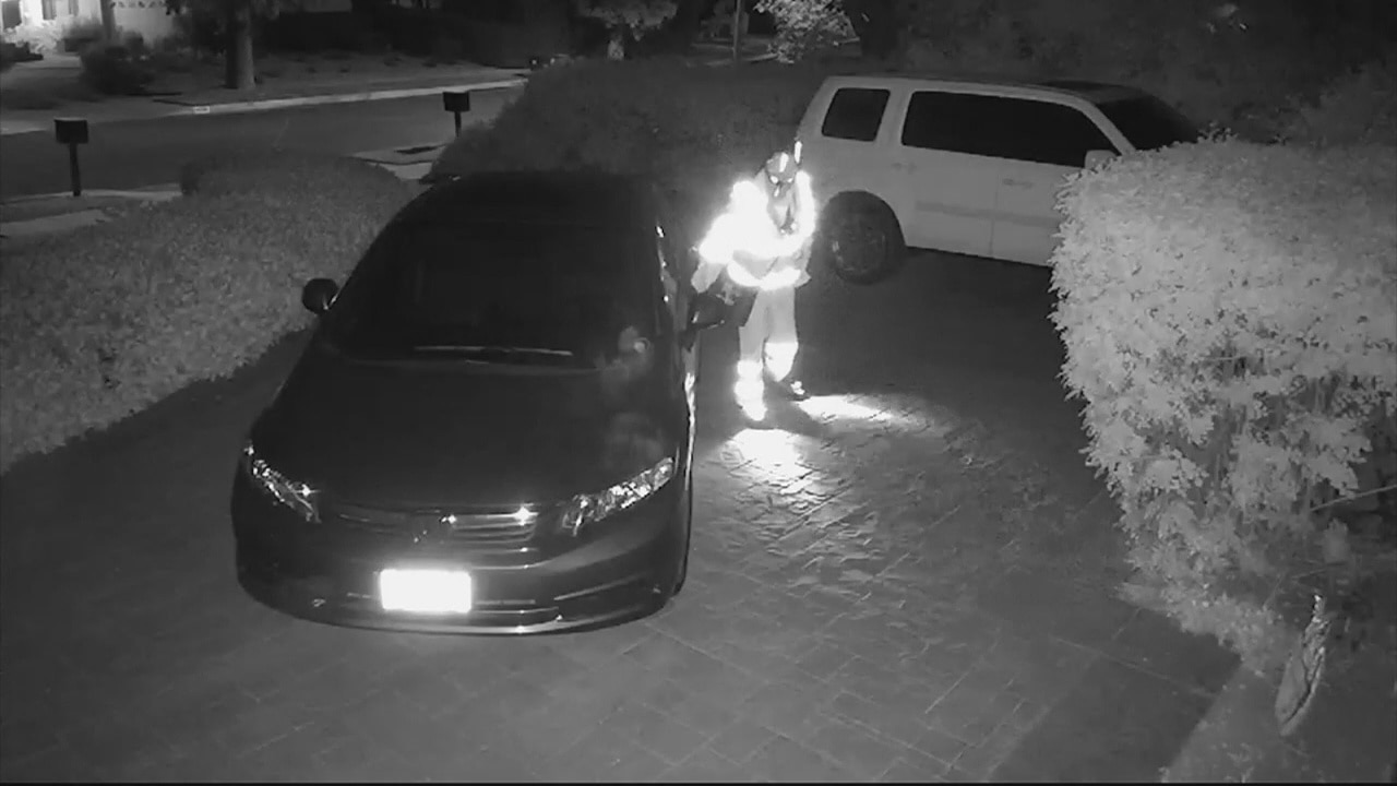 Super hero or evil villain? Video catches mystery man on a mission