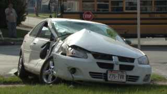 Crash with school bus near 20th and Meinecke