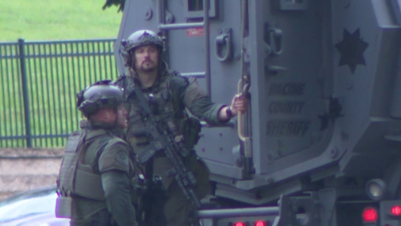 Man dead, woman injured after Burlington standoff