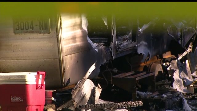Four people accused of burning down trailer