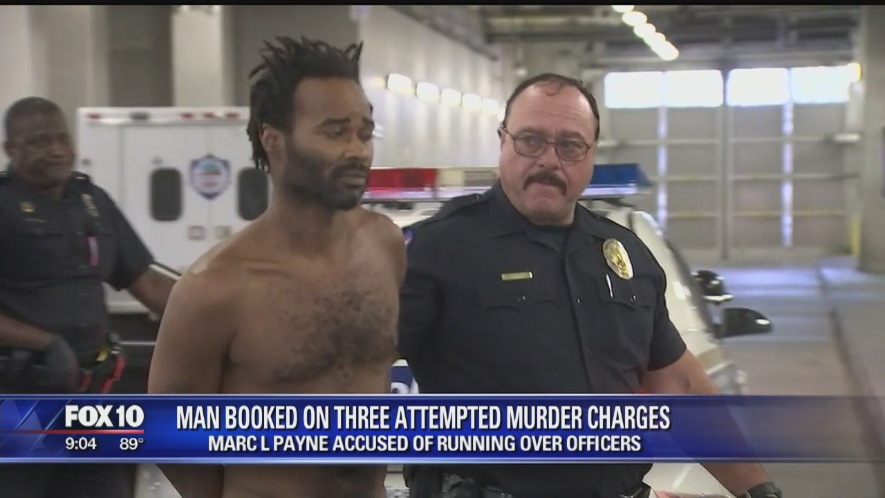 Officers struck by car; driver in custody