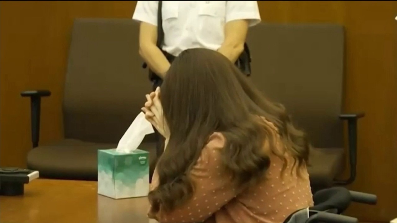 Massachusetts mom accused of killing her 3 kids sobs in court