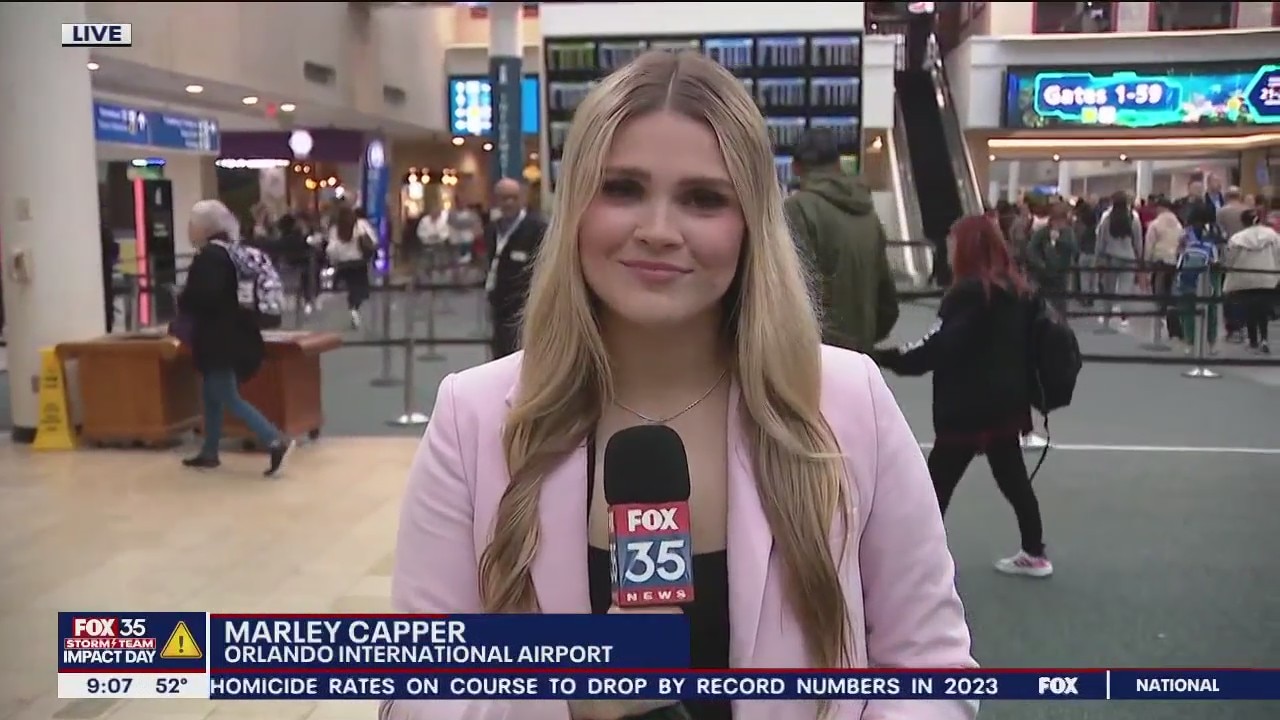 Thousands of people move through Orlando International Airport on the final holiday weekend of the year