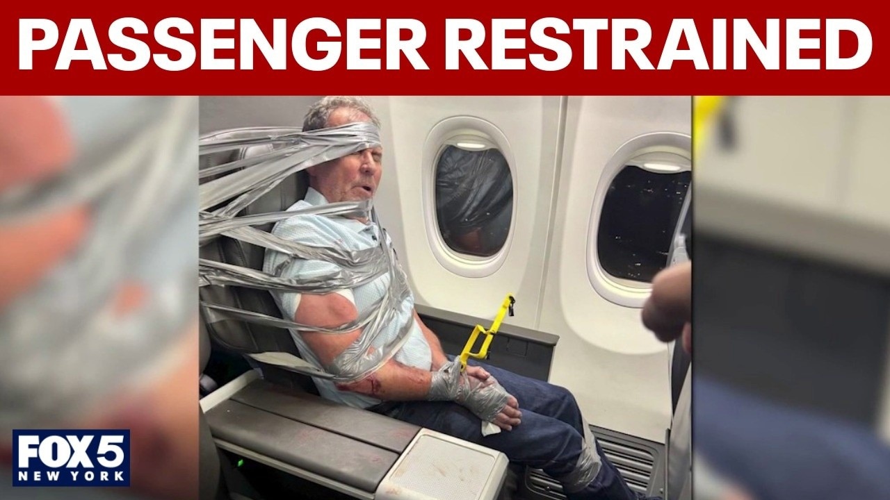 Passengers help restrain 'violent' man on flight
