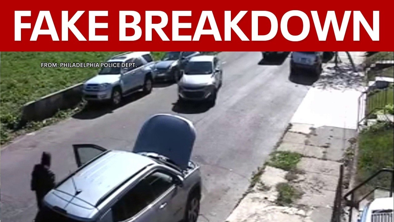 Woman robbed at gunpoint after stopping to help with staged car breakdown