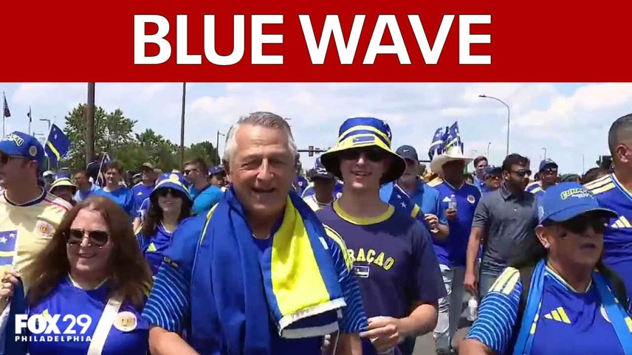 "Blue Wave" of Curaçao fans march to Philadelphia Stadium