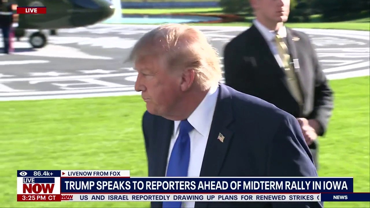 Trump speaks to reporters ahead of rally in Iowa 