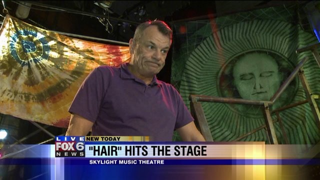 Laura checks out stage, props for "Hair" at Skylight Music Theatre