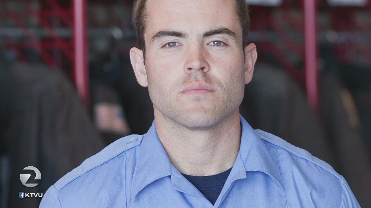 Somber procession for slain Oakland firefighter